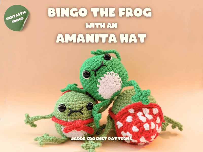 Three green crochet frogs with an Amanita hat on a beige background, featuring 'Fantastic Frogs' branding.