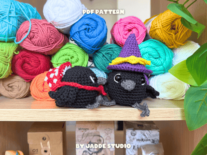 A hand holds a small purple crocheted donut-shaped item against a blurred colorful background. White text on the image reads 'THE INSIDE IS CLEAN' with an arrow pointing to the item, and 'BY JADDE STUDIO' appears at the bottom.