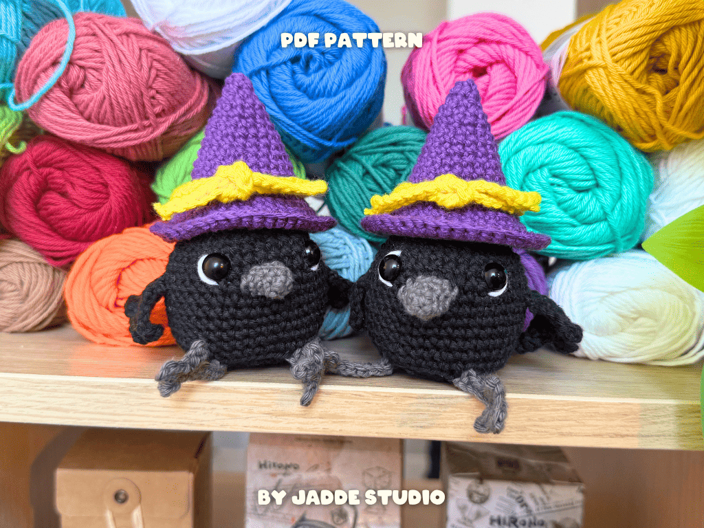 A hand holds a small purple crocheted donut-shaped item against a blurred colorful background. White text on the image reads 'THE INSIDE IS CLEAN' with an arrow pointing to the item, and 'BY JADDE STUDIO' appears at the bottom.