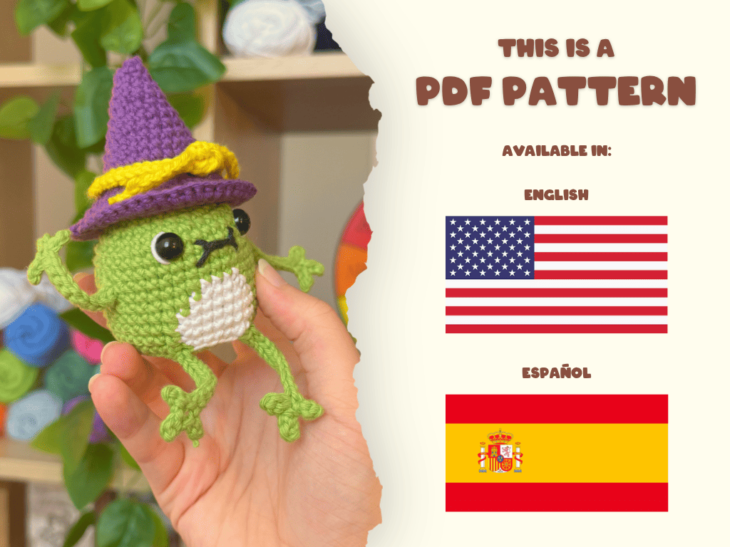 A hand holds a small crocheted frog character wearing a purple wizard hat with a yellow band. The right side of the image has a torn-paper style panel with text reading 'THIS IS A PDF PATTERN' and flags for English and Español, indicating the pattern is available in those languages.
