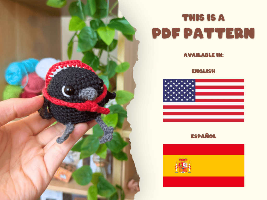 A hand holds a small crocheted bird plush wearing a red headband and red scarf. The right side of the image is a cream-colored panel with text reading 'THIS IS A PDF PATTERN' and flags for English and Español, indicating the pattern is available in those languages.