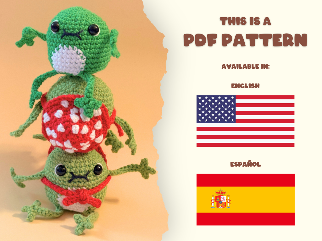 A crocheted stack of three green cartoon frogs with a red-and-white spotted mushroom on top, shown beside text reading 'THIS IS A PDF PATTERN' and flags for English and Spanish.