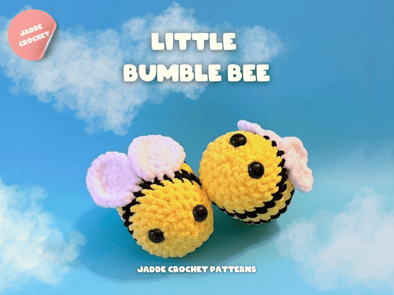 Crocheted bee toy with a blue sky background