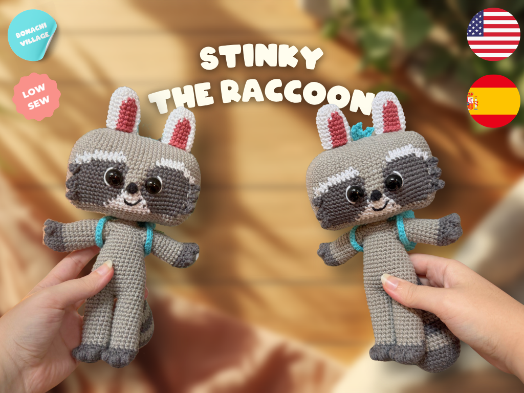 Two handmade crocheted raccoon dolls labeled 'Stinky the Raccoon' are held in hands against a warm blurred background. The image includes promotional badges reading 'Embroidery Machine,' 'Low Sew,' and flags for USA and Spain.