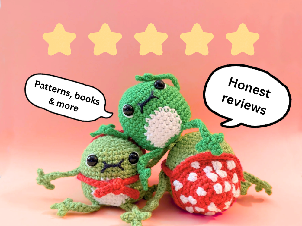 Two green crocheted characters with speech bubbles indicating 'Patterns, books & more' and 'Honest reviews' on a pink background with five yellow stars.